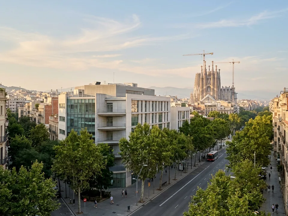 A modern hospital building in Barcelona with the Sagrada Familia on the skyline